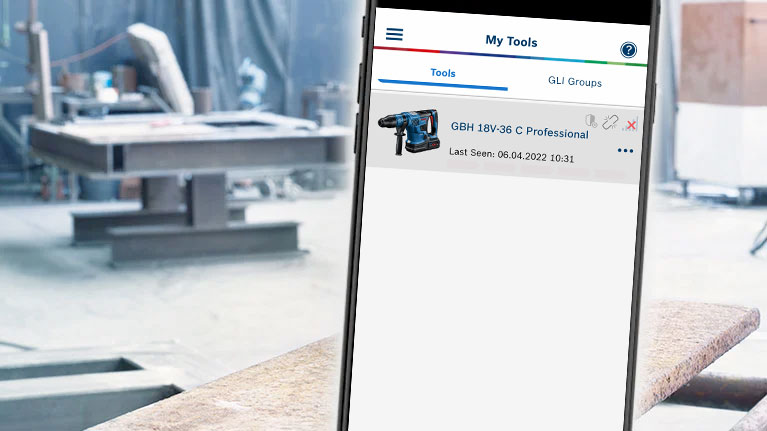 Smartphone shows Bosch Professional GBH 18V-36 C in workshop environment.