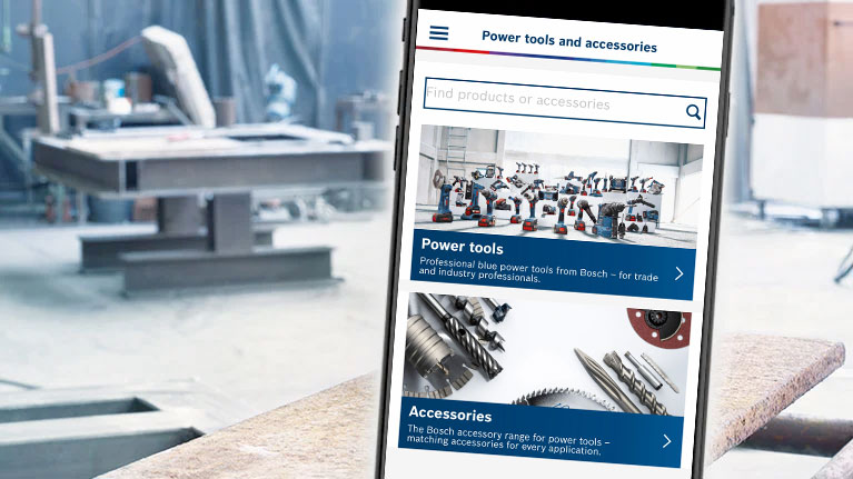 Smartphone displays Bosch tool catalog in a workshop environment.