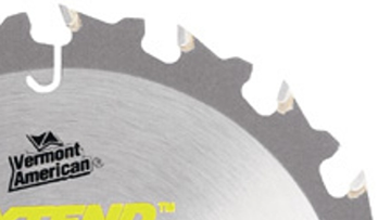 A silver circular saw blade tip with yellow logo and lettering.