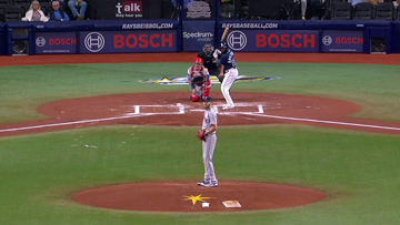 Baseball game: Batter, catcher, and pitcher on the field.