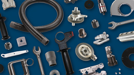 Various Bosch Professional tools and accessories on a blue surface.