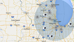 A digital map shows cities in Illinois and Iowa with routes.